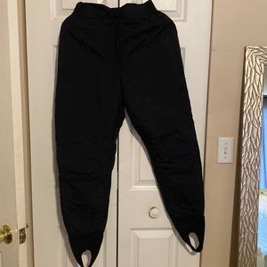 Black ski pants with stirrup.